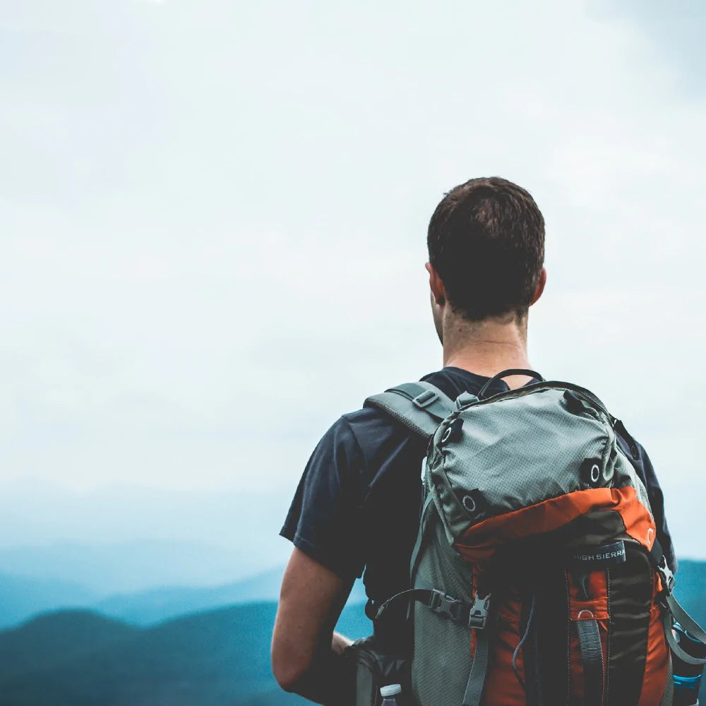 Hiker wearing Echo-Sigma Backpack