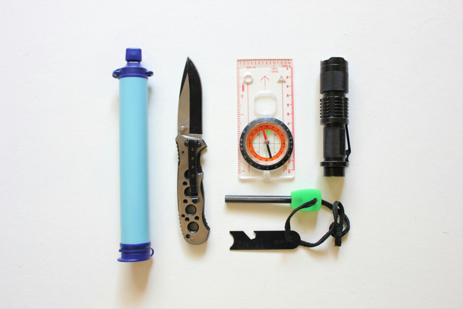 survival gear on white background